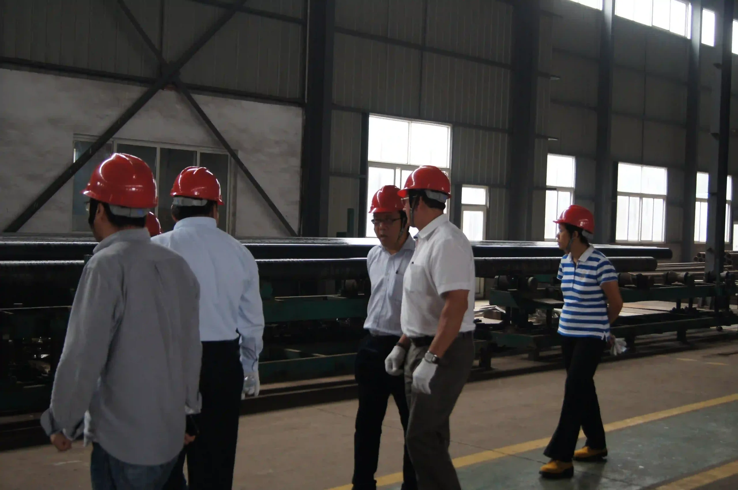 Overseas buyers visiting the XJY Plate factory