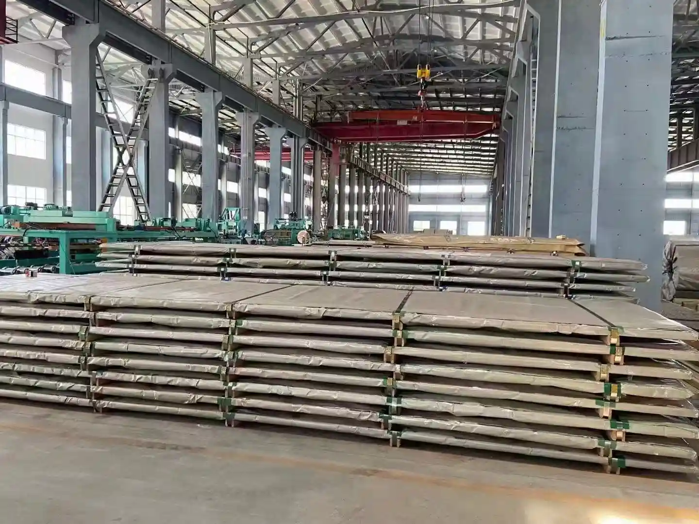 Packed steel plate bundles ready for export